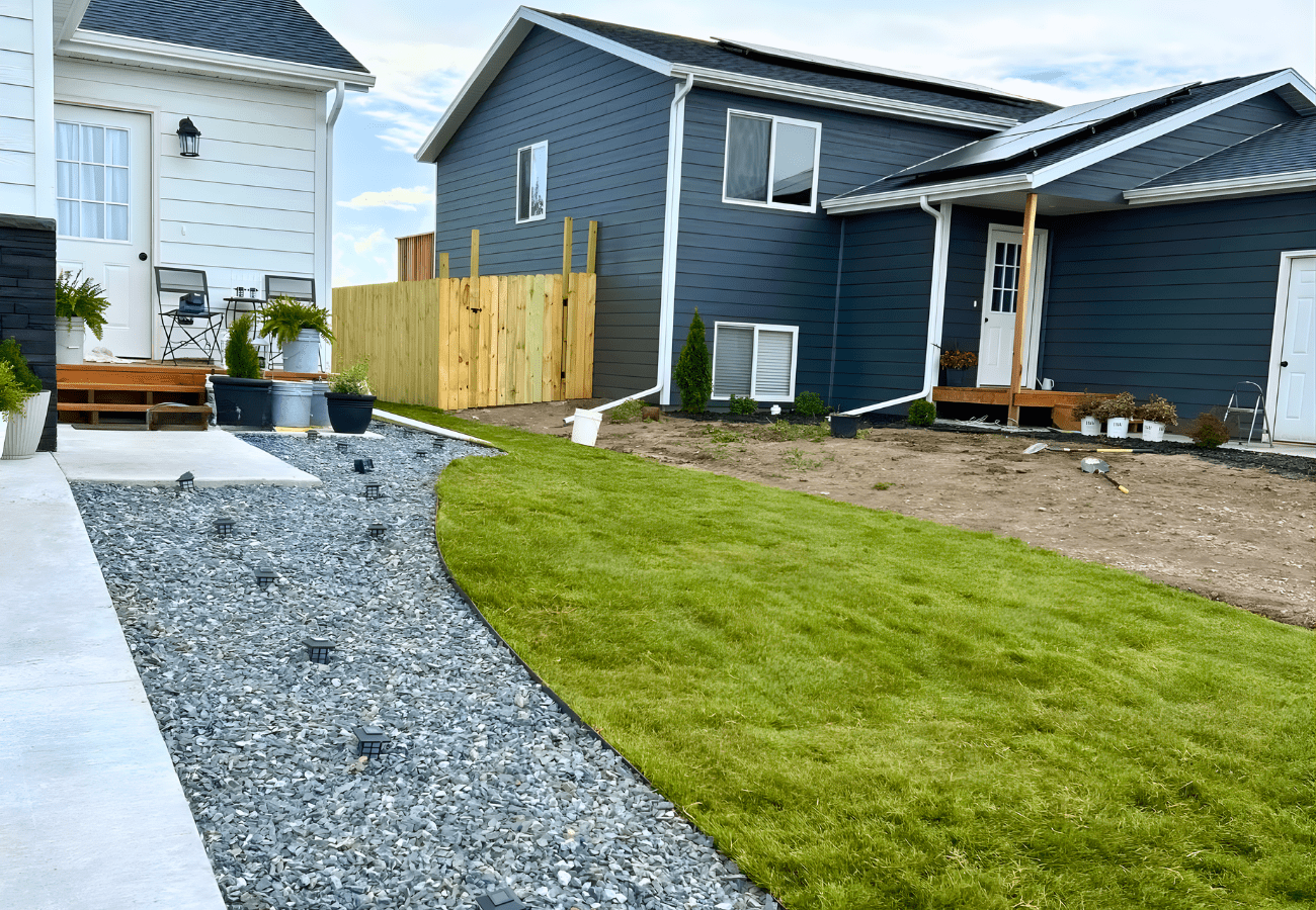 Newly installed rock with lighting and grass at residential home in Rapid City